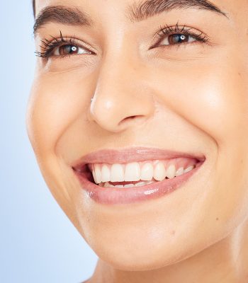 skincare-model-face-smile-and-beauty-by-blue-back-2023-11-27-05-14-19-utc